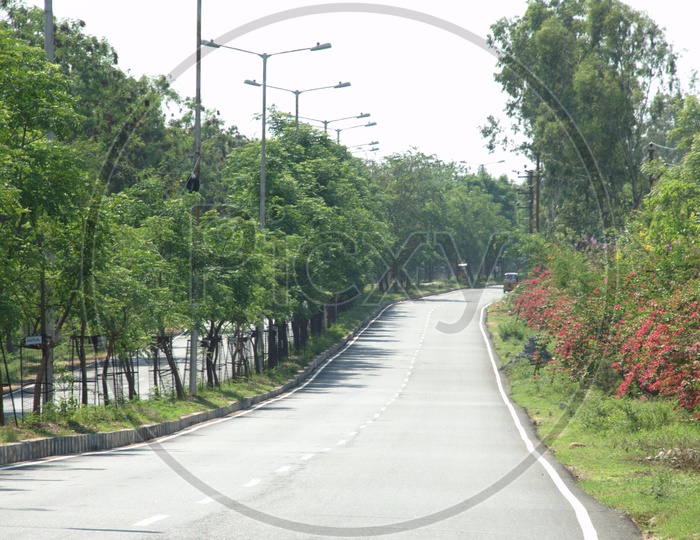 A empty tar road in an urban area