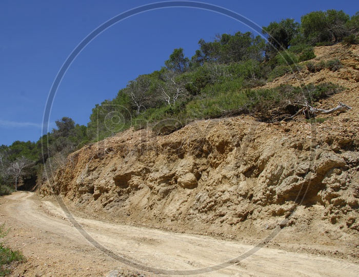 A Dirt Road alongside the hill