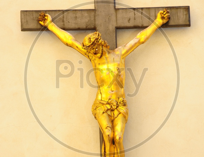 Jesus crucification staute on the wall