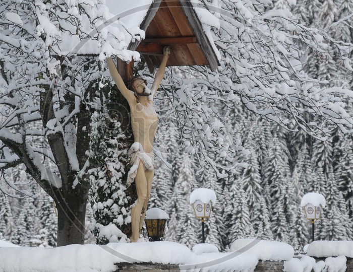 Jesus statue in the snow