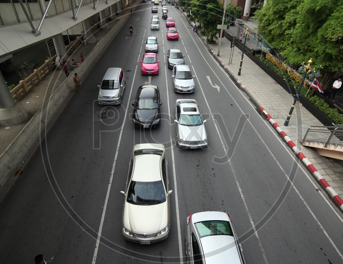 Vehicles moving in lanes of a road
