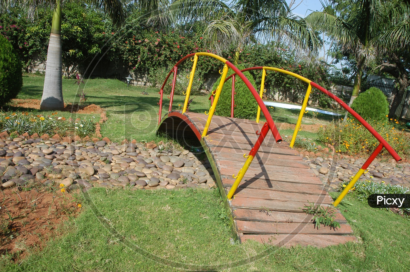 A Small Bridge In a Lawn Garden