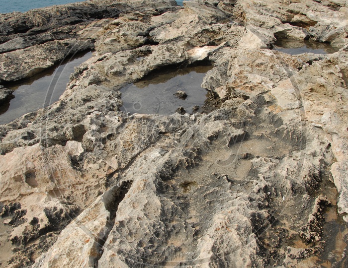 Water in seashore rock