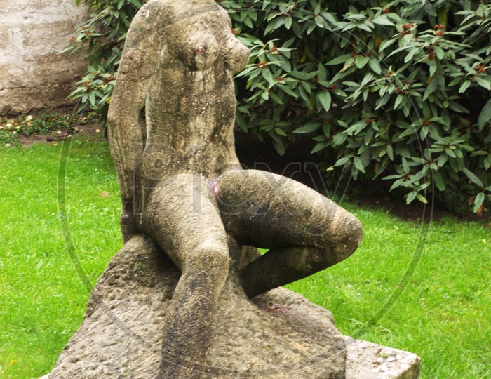 Antique stone garden statue