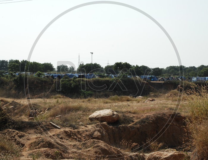 Tents in Barren Lands at  City Outskirts