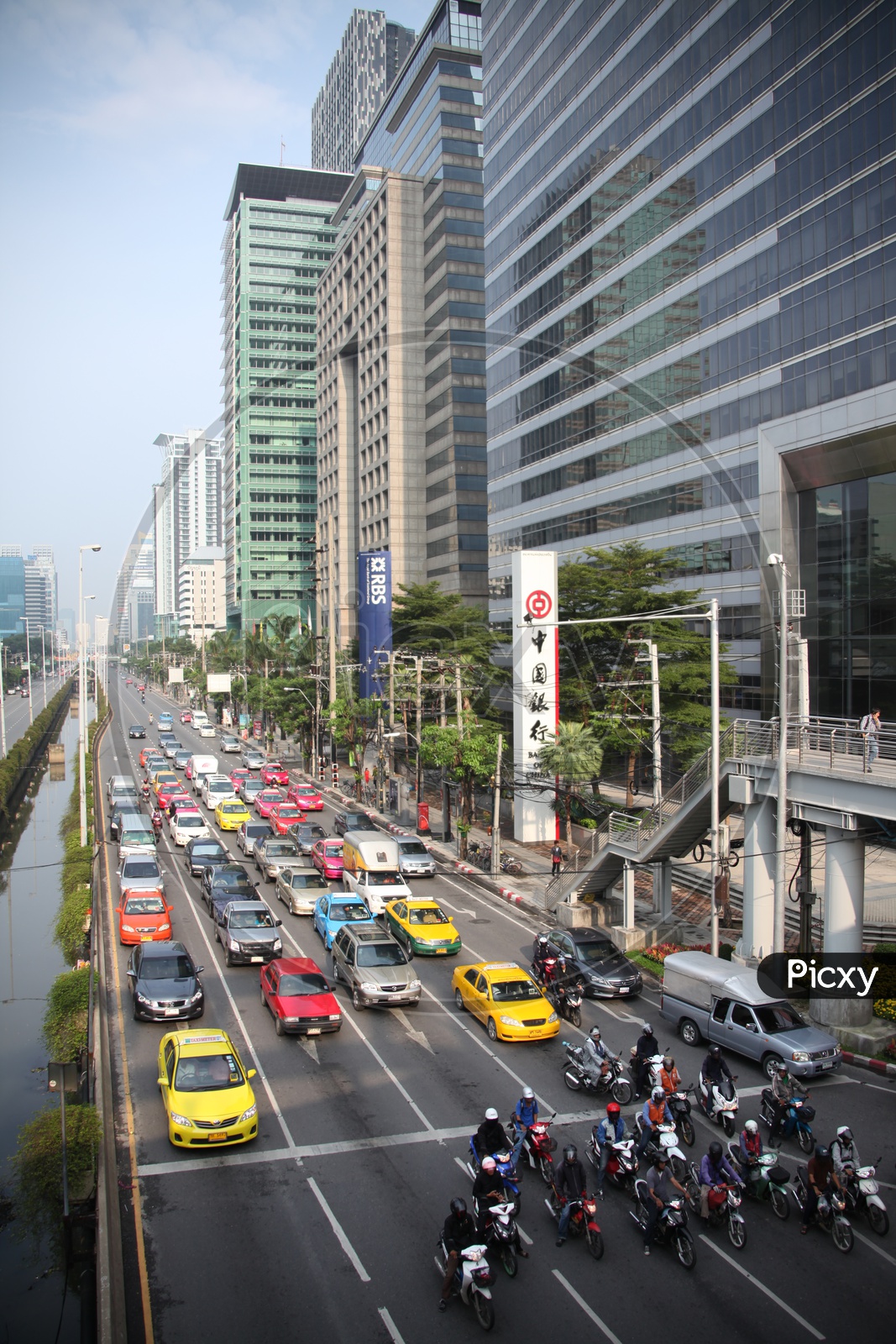 Vehicles moving in lanes at bangkok city
