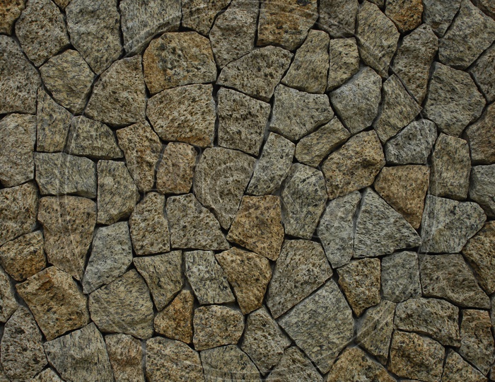 close shot of a wall built with rocks