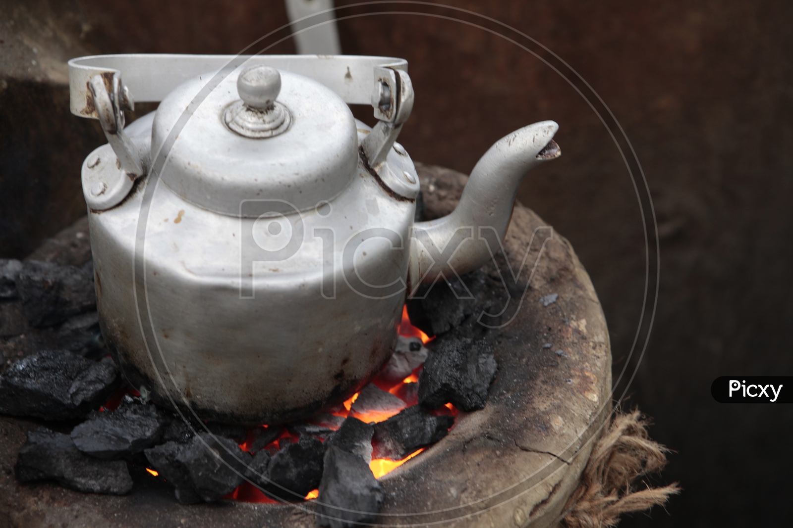 Tea Pot on a Coal Furnace Stove