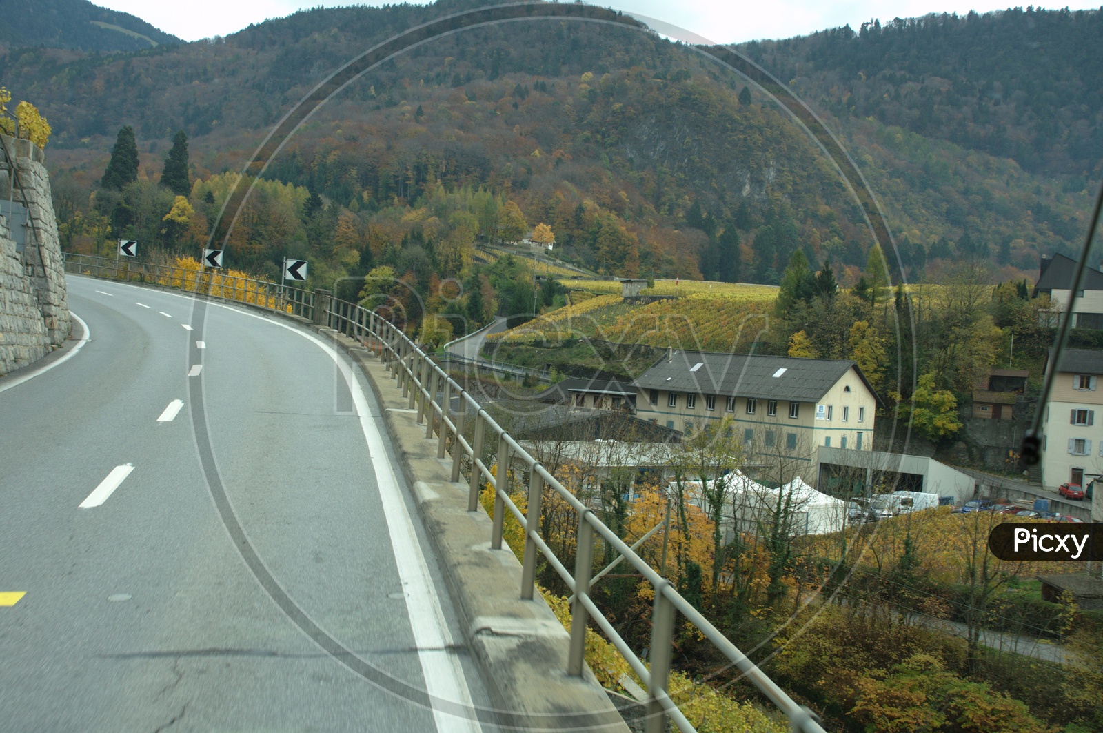 Road curve alongside the Alpines