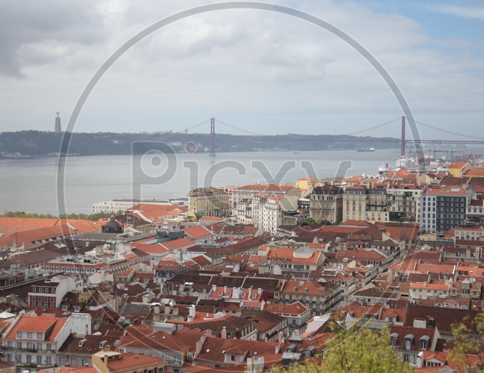 Lisbon city view and 25 De Abril bridge