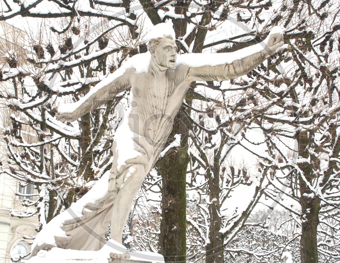Statue covered with snow