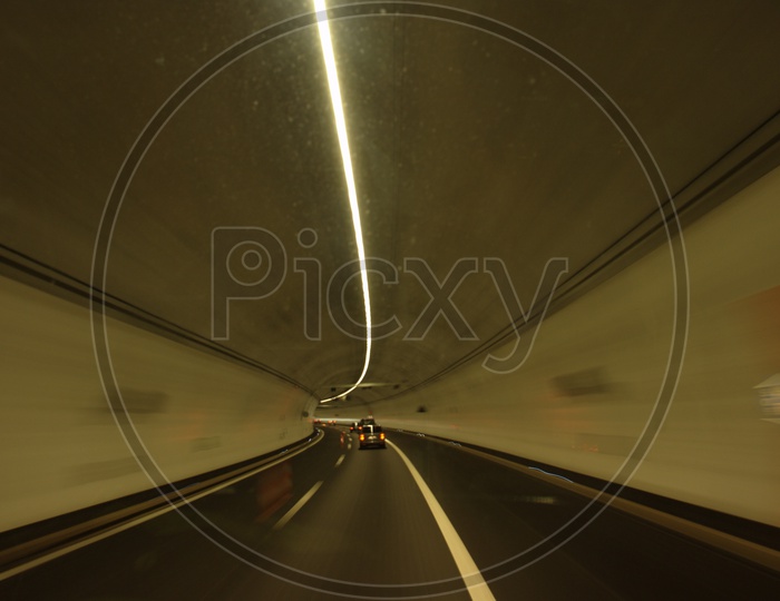 Car moving in a tunnel