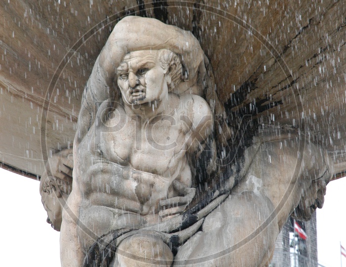 A Statue during the snow