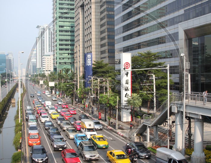 Vehicles moving in lanes at bangkok city