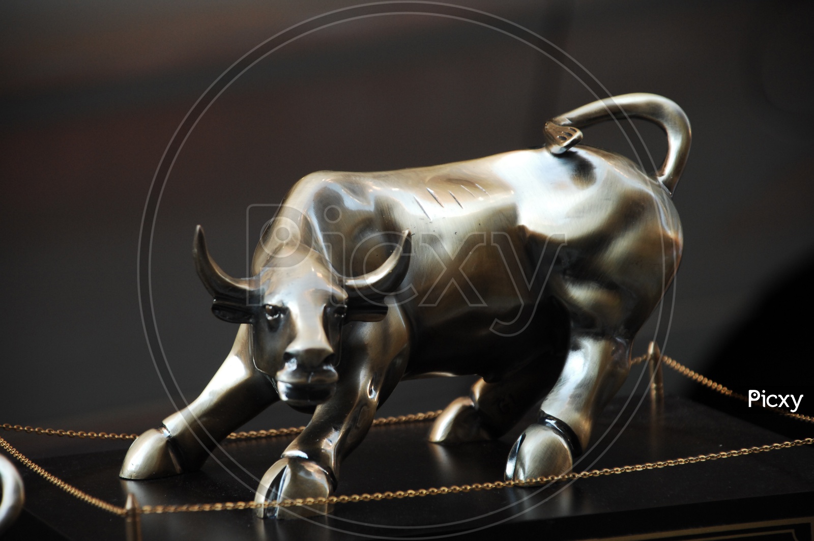 A bronze sculpture of a bull