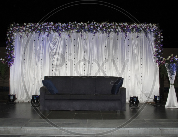 Sofa on a stage