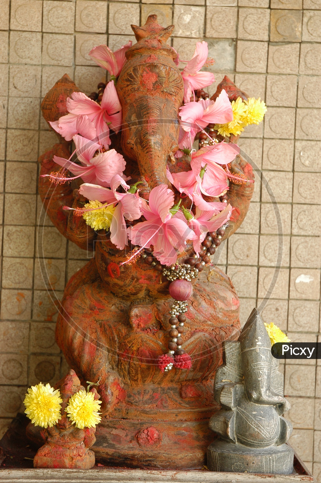 Lord Ganesha Statue decorated with flowers