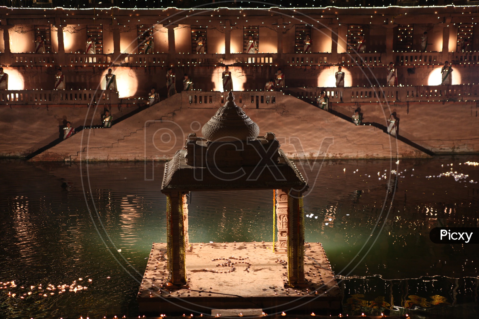 Temple Kolan with lights and diyas in the night