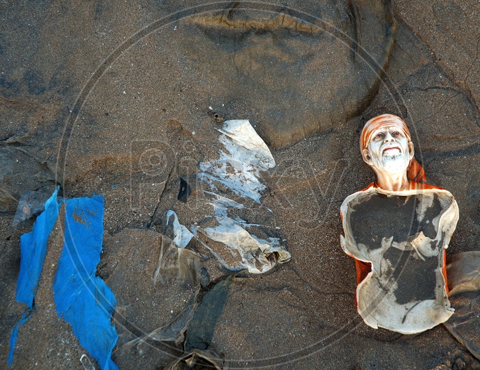 Remains of Baba Idol in the mud