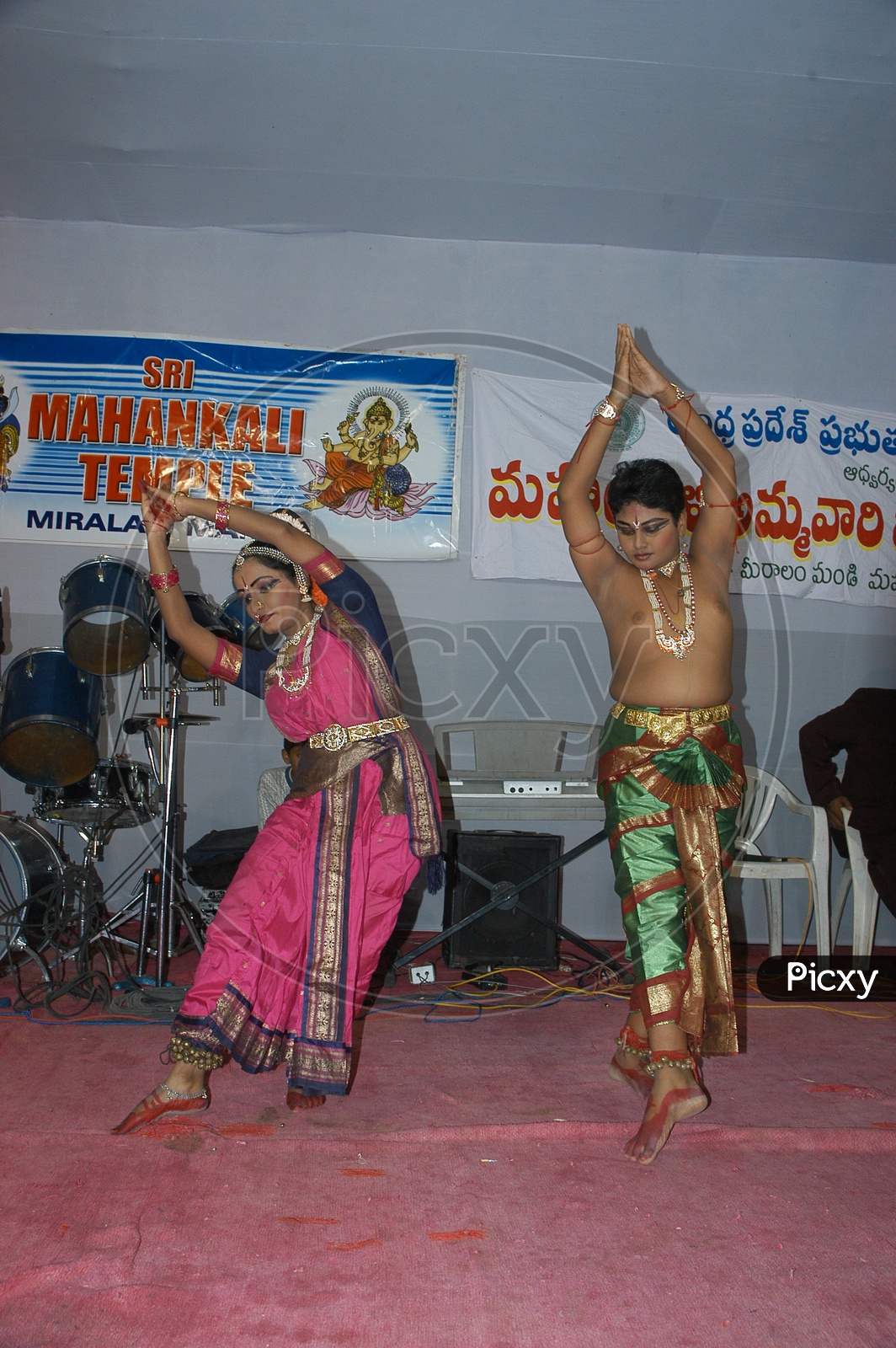 Bharathanatyam Dance Artists Performing On a Stage