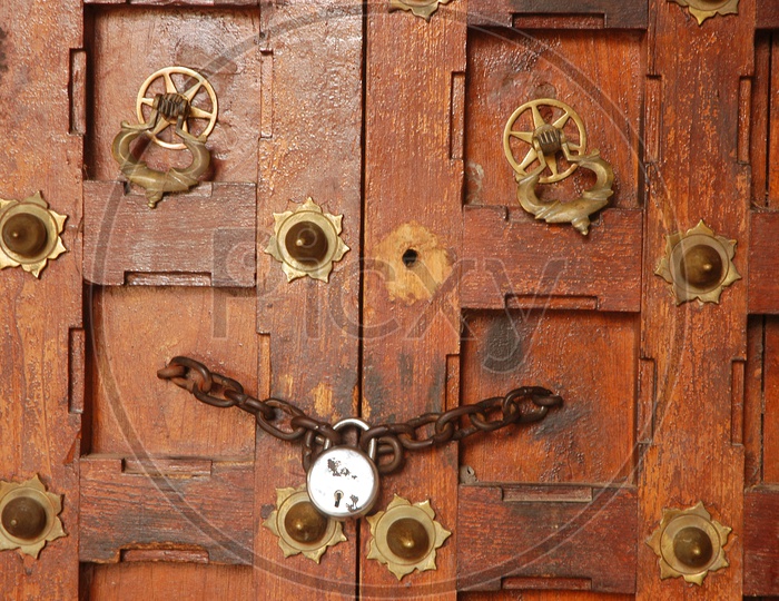 Ancient door locked with chain
