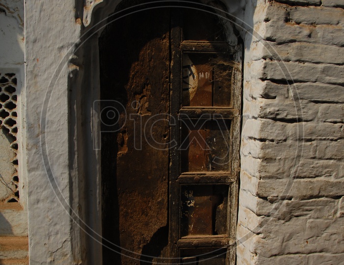Old Wooden door and brick wall