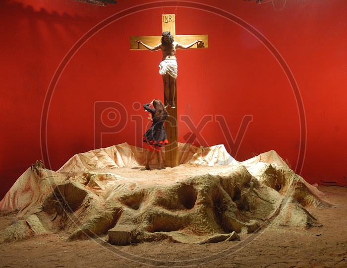 People performing Jesus crucification during a christian skit