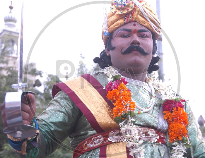 A costumed man during Bonalu festival
