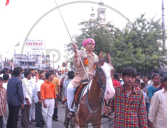A man riding horse during the festival