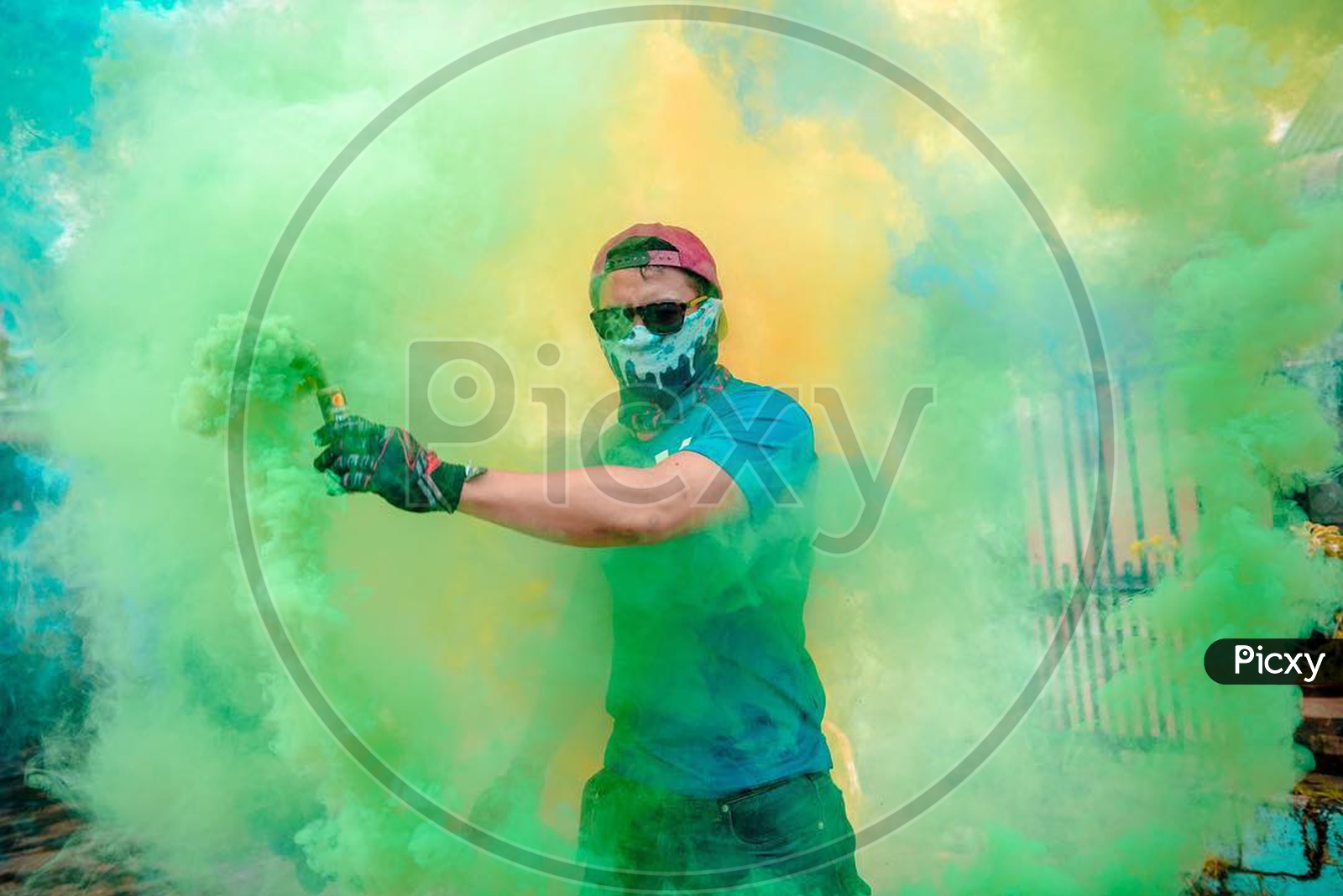 A person with a smoke bomb in the hand