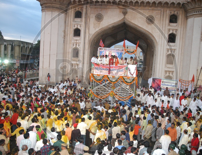 Crowd alongside the Charminar during Bonalu festival