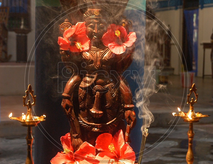 Hindu Goddess statue decorated with flowers