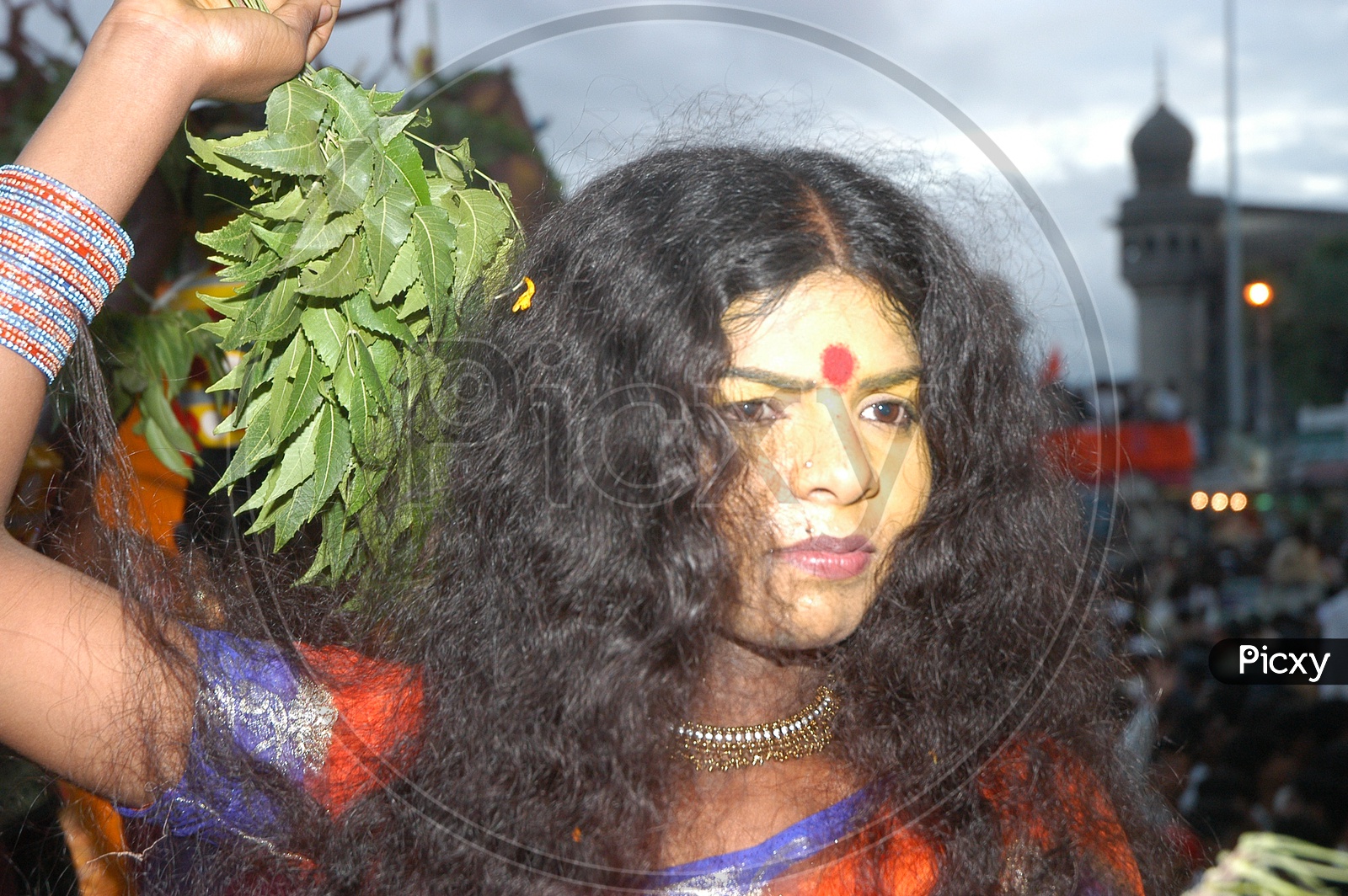 A woman dressed up for Bonalu festival