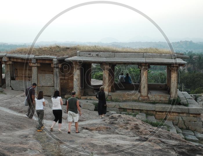 Tourists at Hampi temple ruins