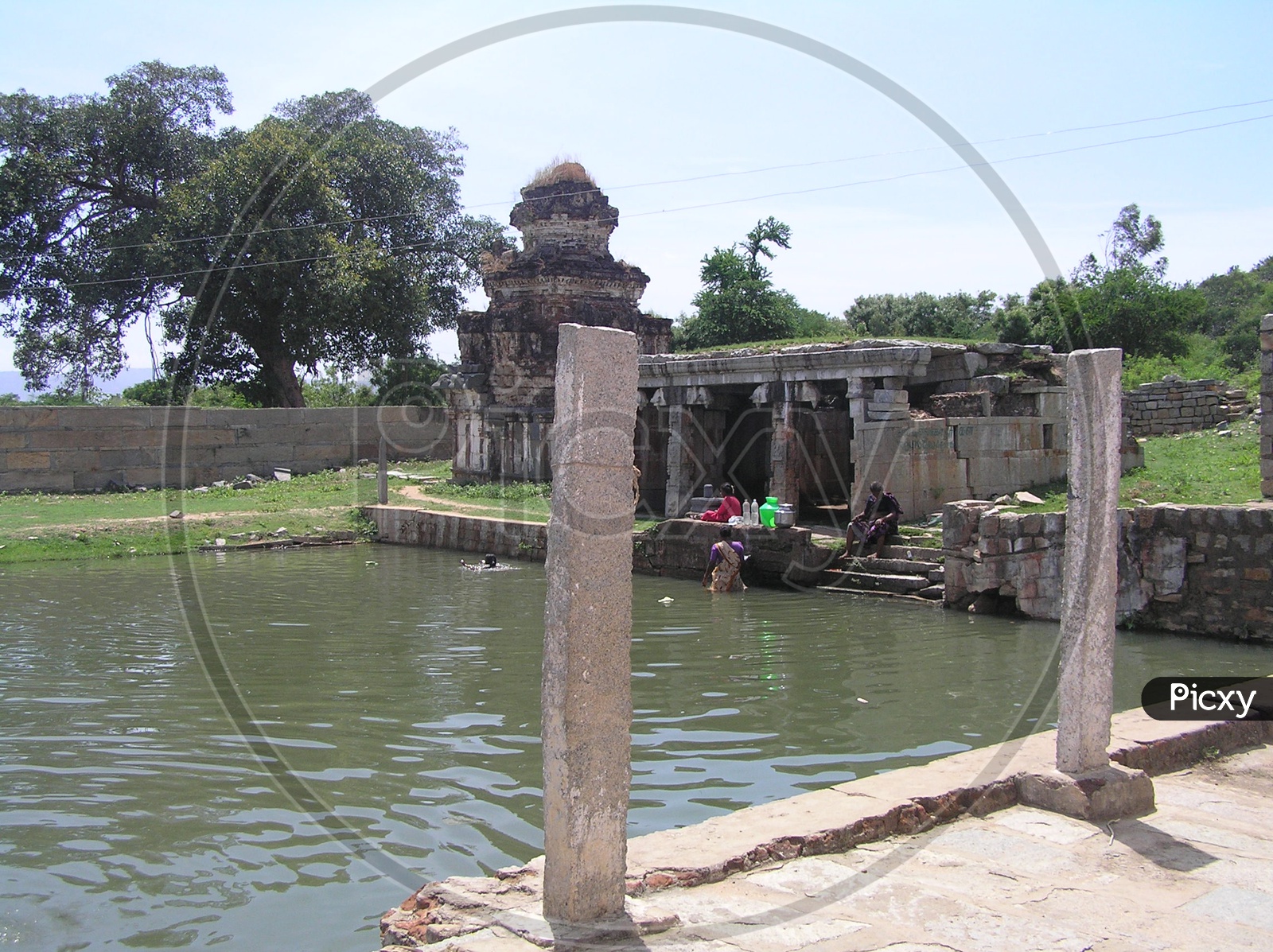 Local People Collecting Water From temple Pond