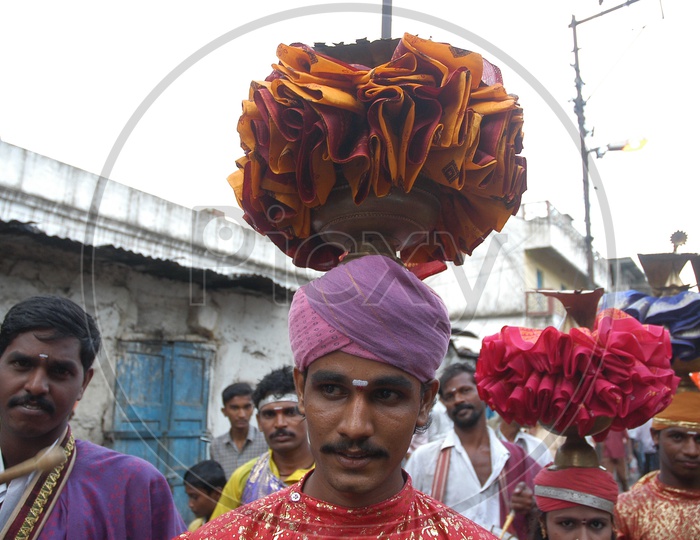 Costumed man during Bonalu festival