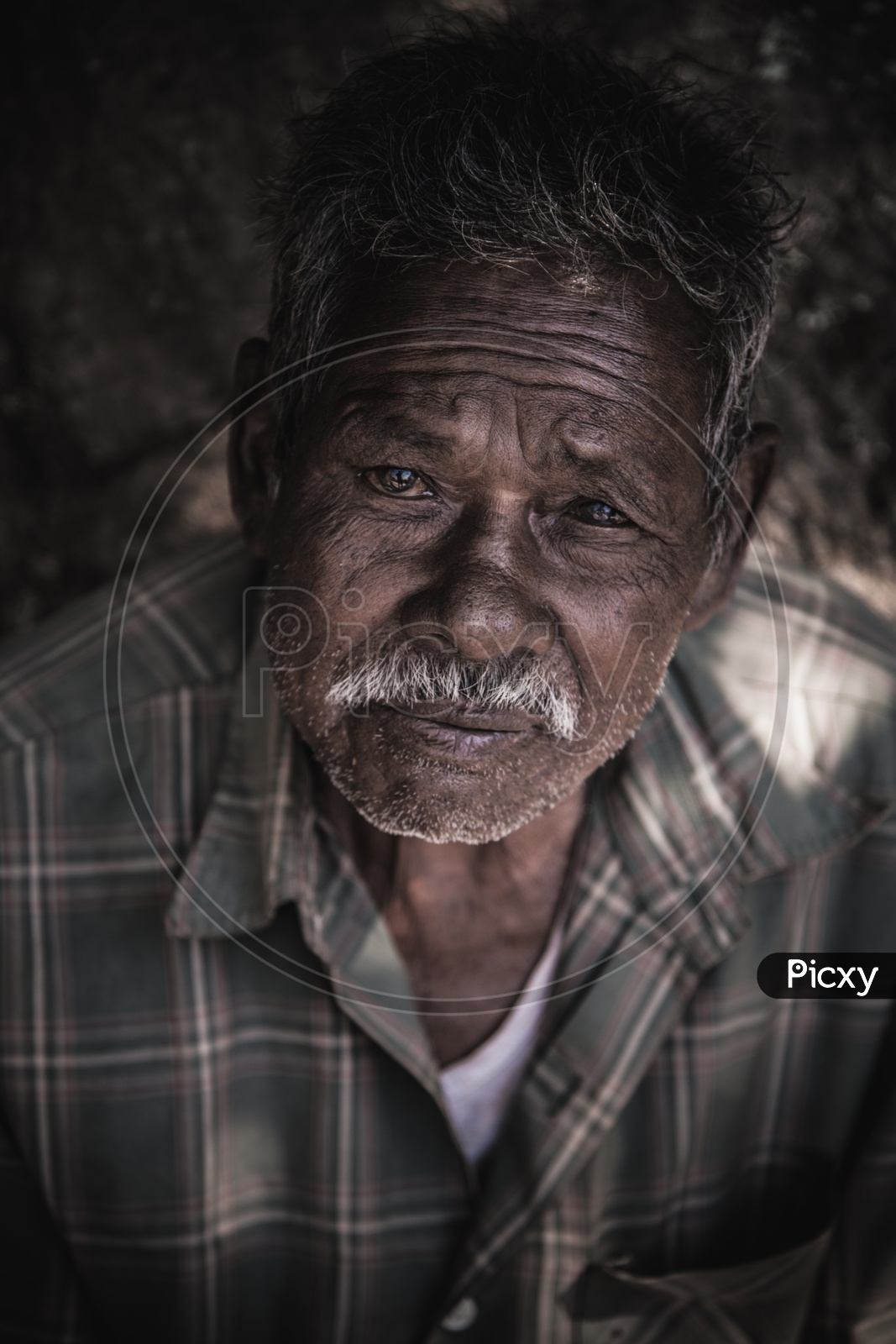 Portrait Of an Old Man In Tribal Village