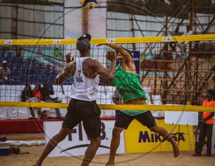 Players Playing  Beach Volleyball