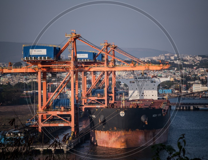 Heavy Cranes Loading The Ships On Harbor