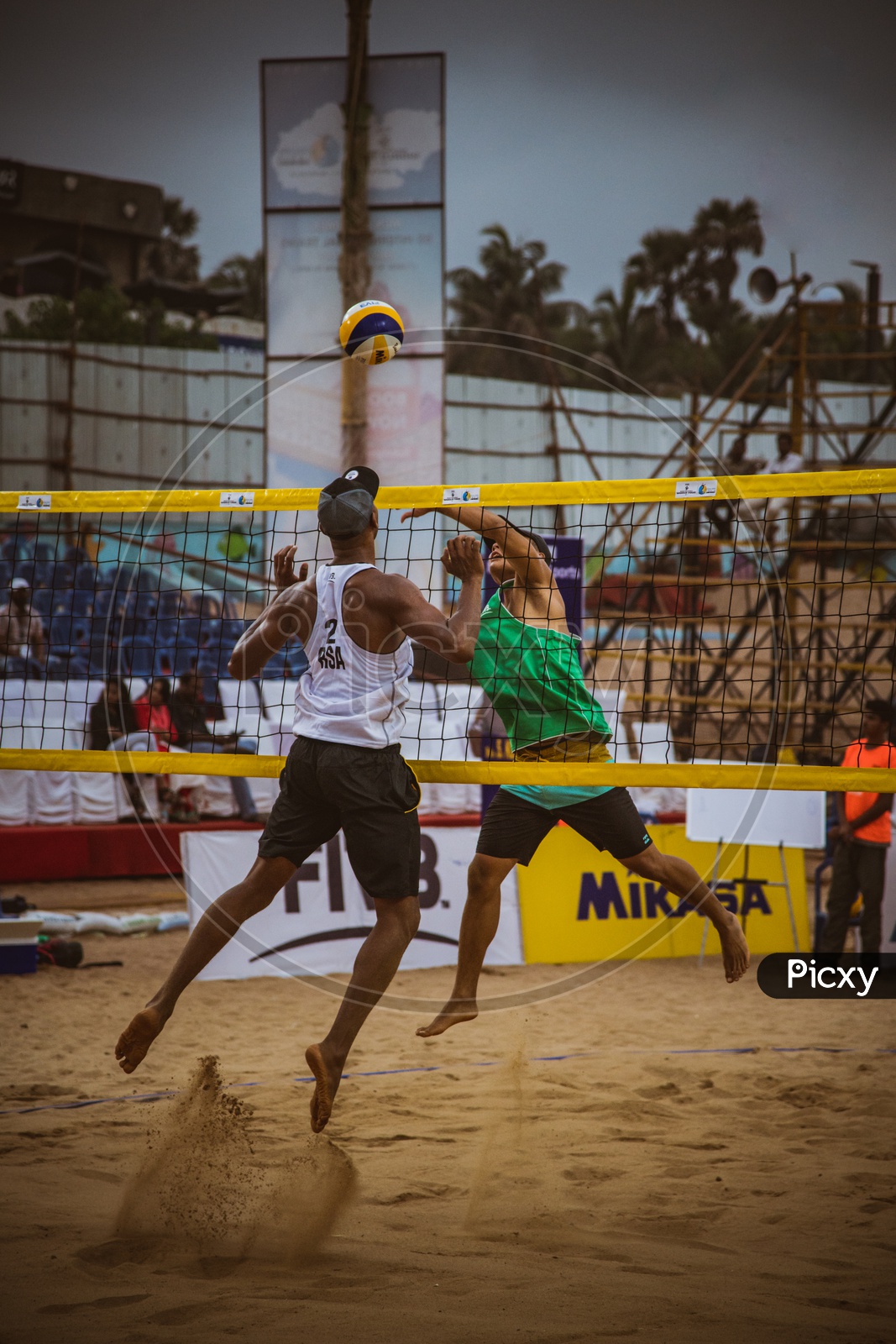Players Playing  Beach Volleyball