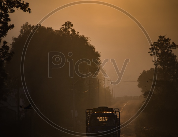 Silhouette Of a Truck Auto on Rural Roads