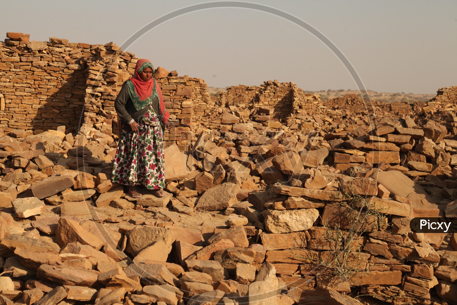 women walking at the Ruins of the desert