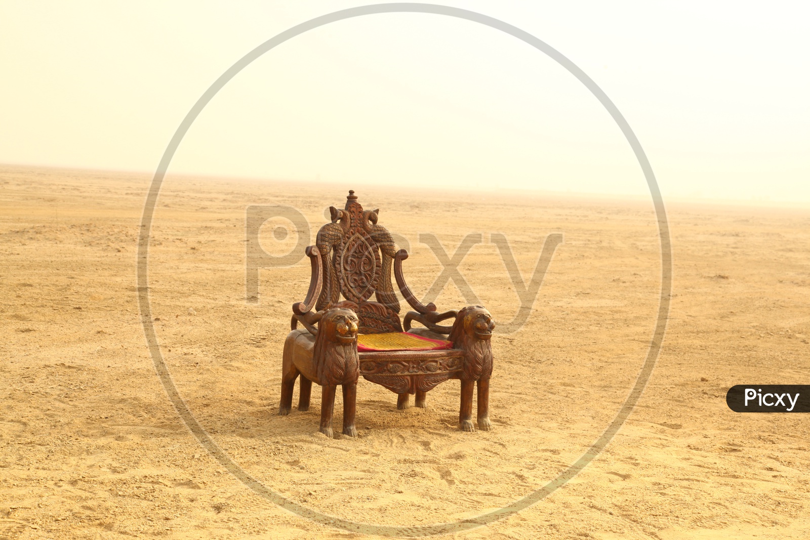 A wooden chair in the desert