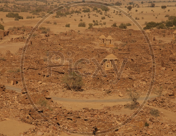 Ruins of brick buildings in a desert