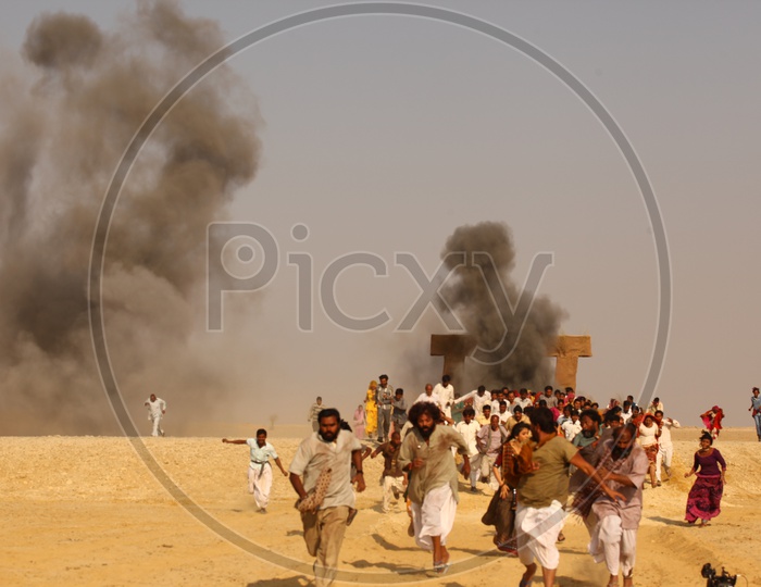 People running in the desert