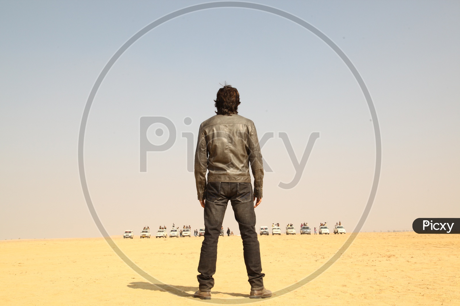 A person standing in the desert