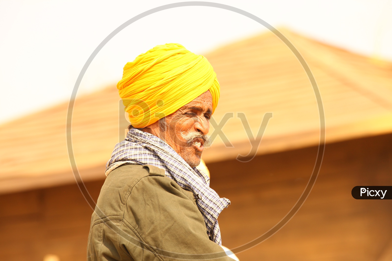 Local man wearing yellow turban