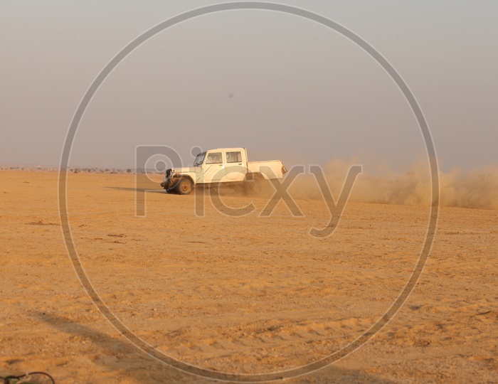 Vehicle moving in a desert