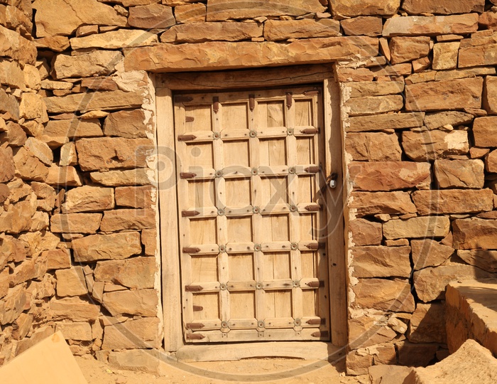 Ruins of an ancient door in a desert