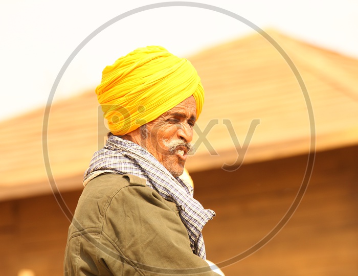 Local man wearing yellow turban